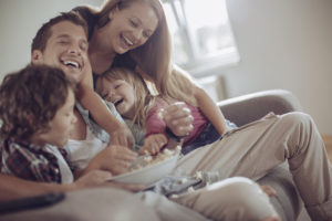 family in home with right size of oil tank