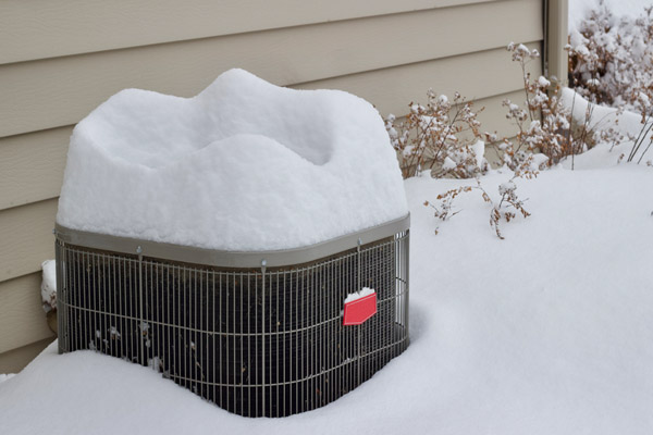 air conditioner condenser in snow