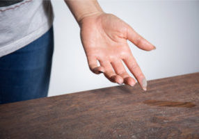image of a homeowner experiencing lots of dust from hvac system