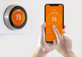 image of a wi-fi thermostat for a home heating system that uses fuel oil