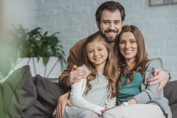 family that uses energy efficient heating oil heating systems