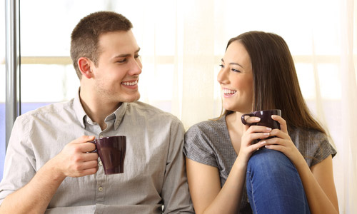 happy couple in living room