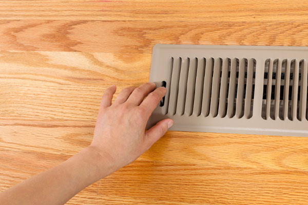 heat pump vent with hvac unit that is blowing cold air in winter