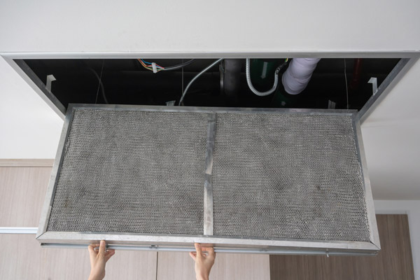 image of a dirty air conditioner filter leading to diminished efficiency