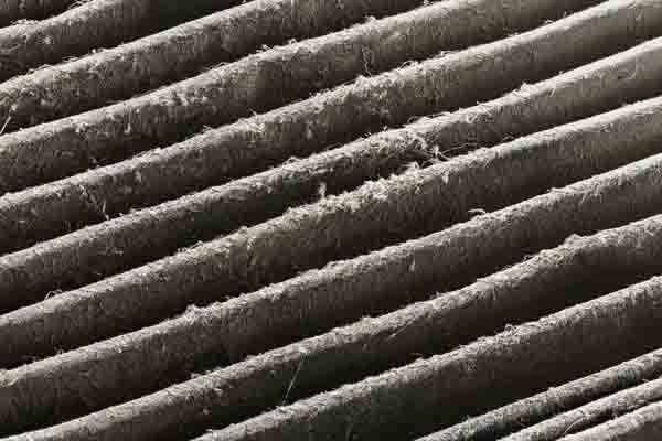 image of a dirty air filter for an air conditioner