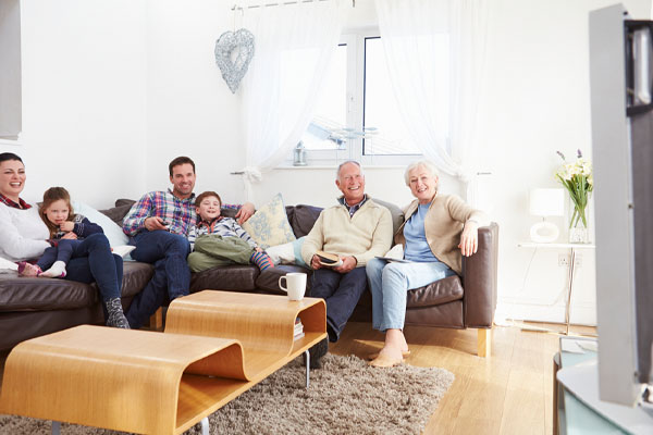 image of a family enjoying comfort of home heating and ductless supplemental heating