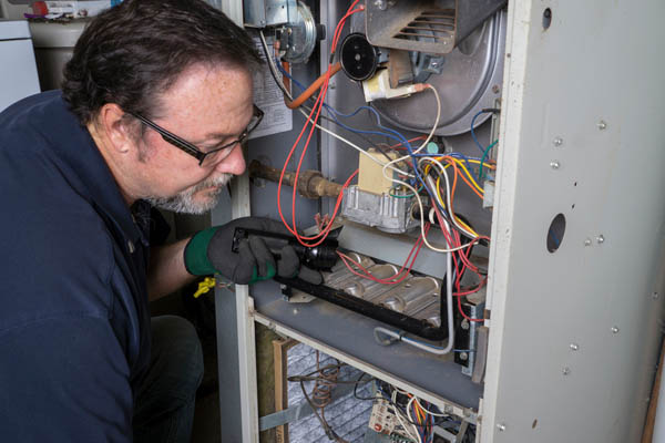 image of a furnace tune-up by an hvac contractor
