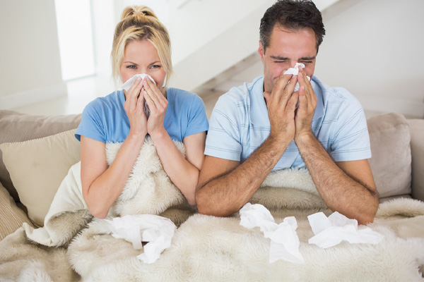 image of a homeowner experiencing allergies