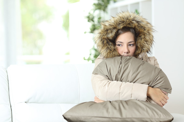 image of a homeowner who has uneven heating in house