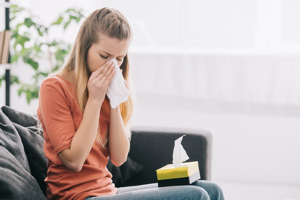 image of a homeowner with respiratory propblems depicting mold and air conditioning unit