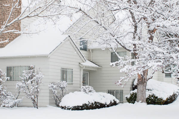 image of a house in snow during the winter