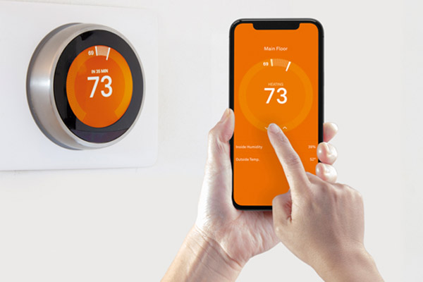 image of a wi-fi thermostat for a home heating system that uses fuel oil