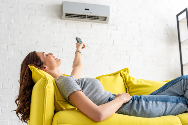 woman enjoying ductless cooling