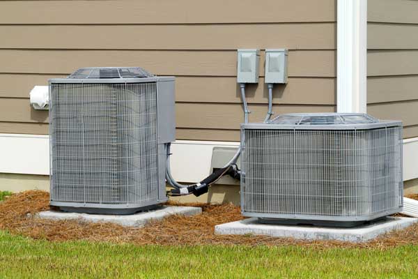 image of an air conditioner condenser depicting ac system maintenance