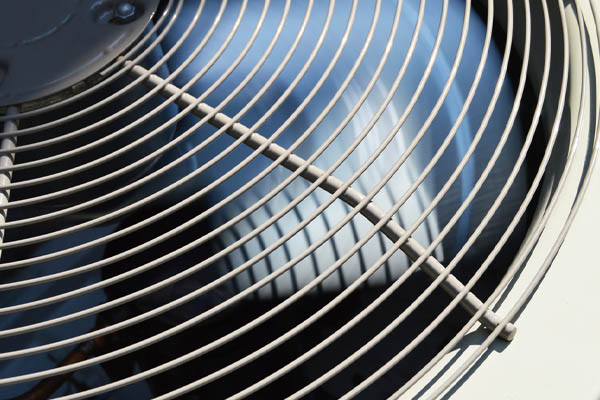 image of an air conditioner fan depicting an air conditioner compressor