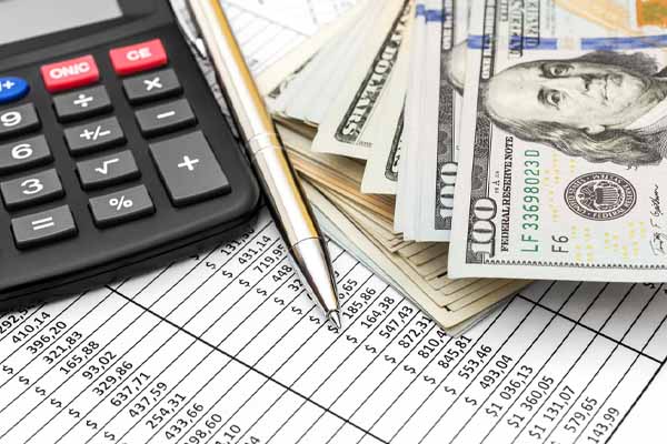 image of calculator and bank notes depicting hvac energy costs