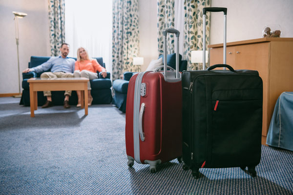 image of couple at hotel during carpet installation