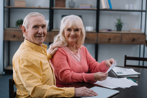 image of couple calculating home energy bills