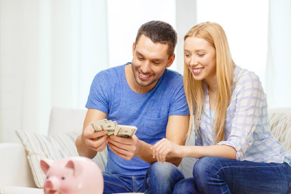 image of happy couple saving money due to energy efficient hvac system in toms river nj