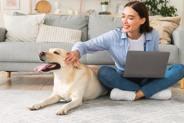 image of homeowner and dog depicting air quality in winter