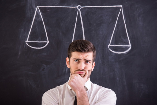 image of homeowner deciding which one depicting portable air filters vs whole home air filtration systems