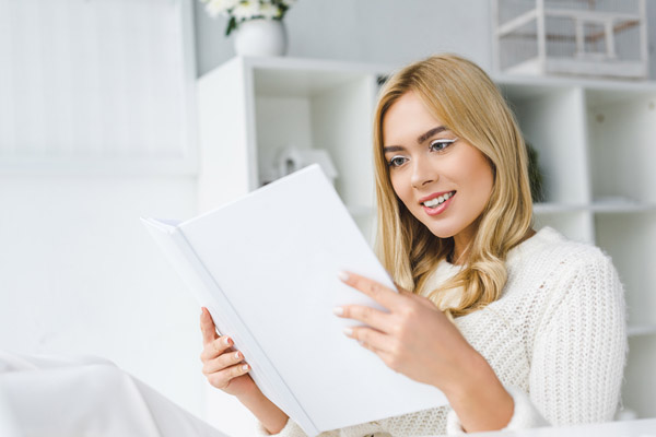 image of homeowner reading hvac warranty paperwork