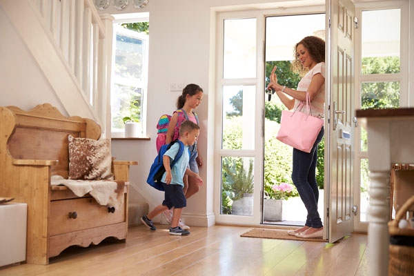 image of mother and children leaving toms river nj house due to suspected natural gas leak