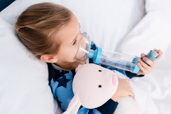 kid with asthma and indoor air quality