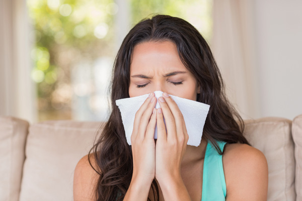 woman experiencing allergies